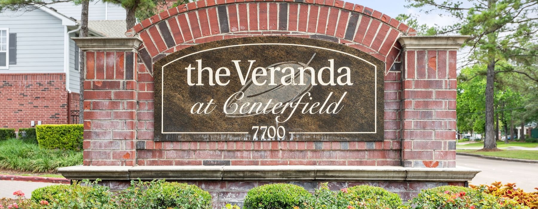 a sign on a brick building